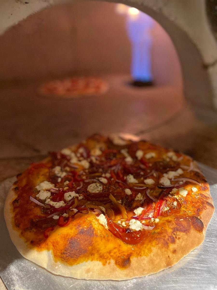 Wood-fired pizza straight out of the oven